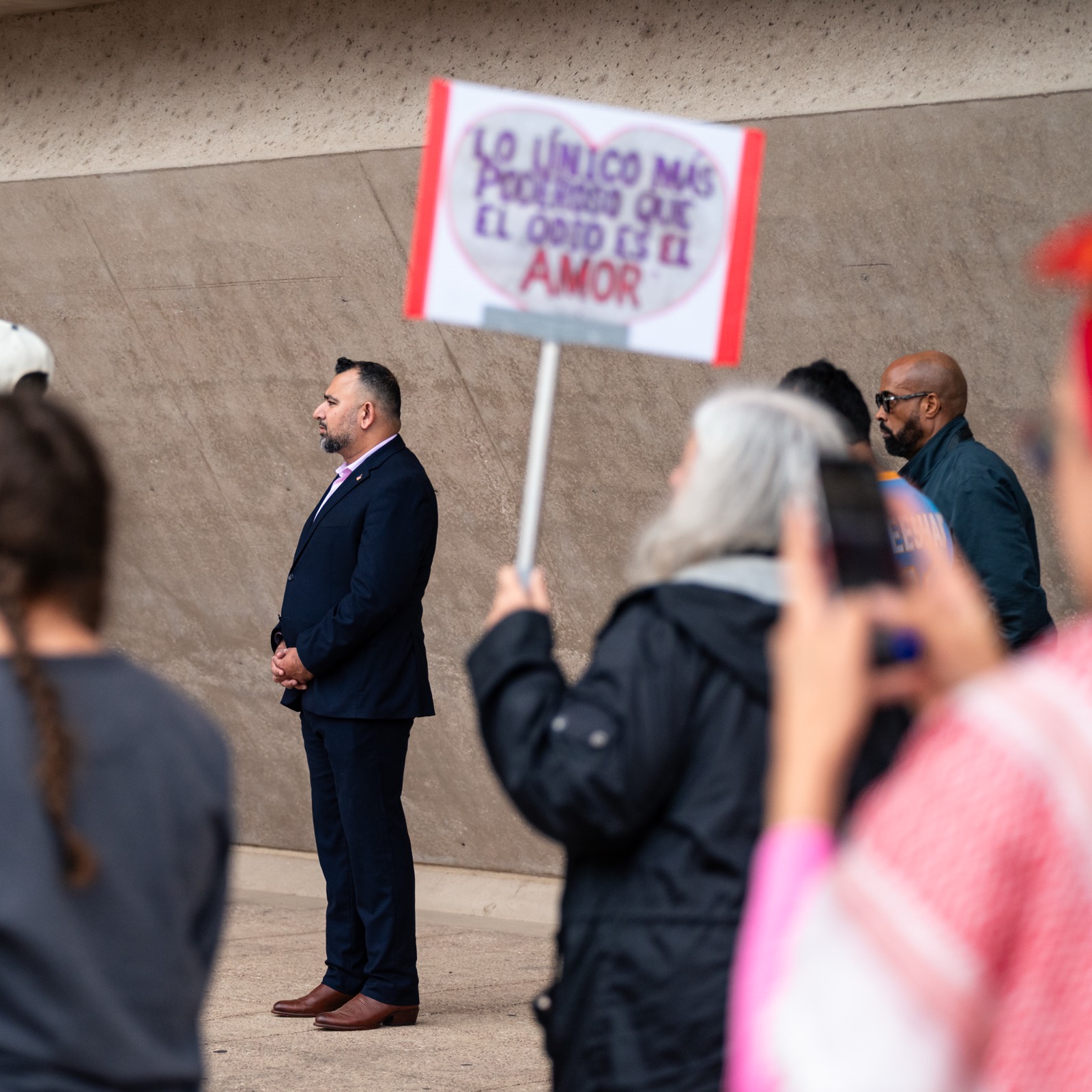 Supporters holding signs at a rally in North Texas